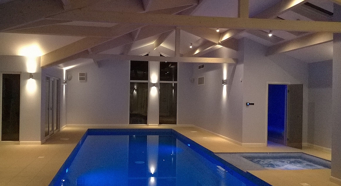 A bespoke residential indoor pool with spa, sauna and steam room